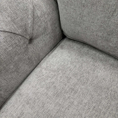 Close-up of the Darwin Silver fabric upholstery, demonstrating the high-quality weave and neutral silver tone.