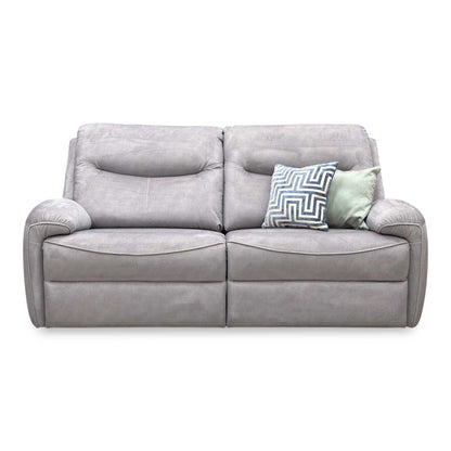 Front view of the charcoal velvet sofa, showcasing the high backs, deep seats, and distinctive arm cushion design exclusive to Furniture Village.