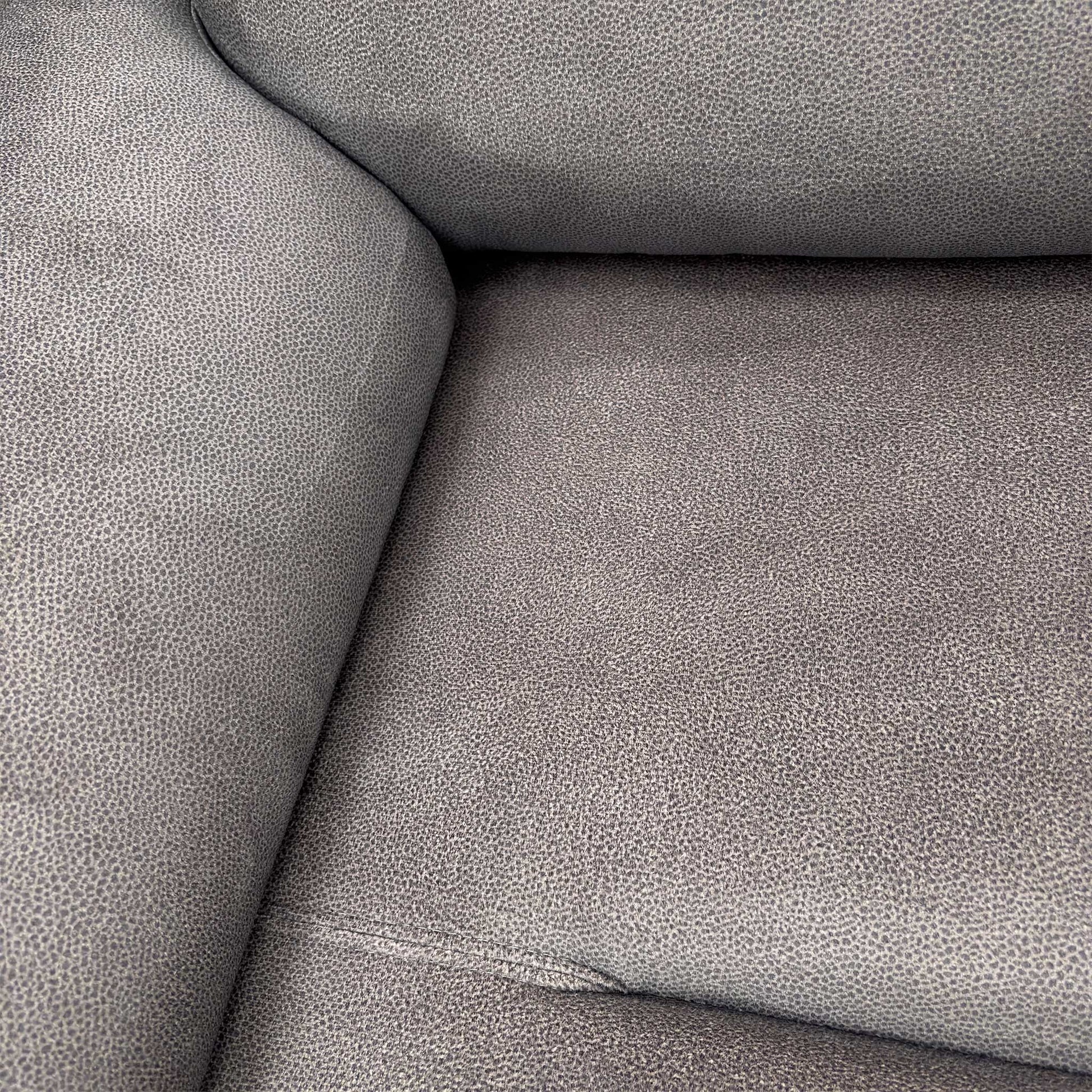 Detail shot of the Stingray Charcoal velvet fabric texture, illustrating the premium finish and luxurious feel of the material.
