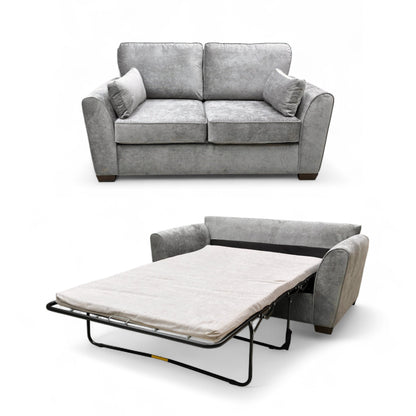 Angled view of the ‘Julius’ 2 Seater Sofa Bed in the sofa position, showcasing the full grey Kingston fabric upholstery and plump cushions.