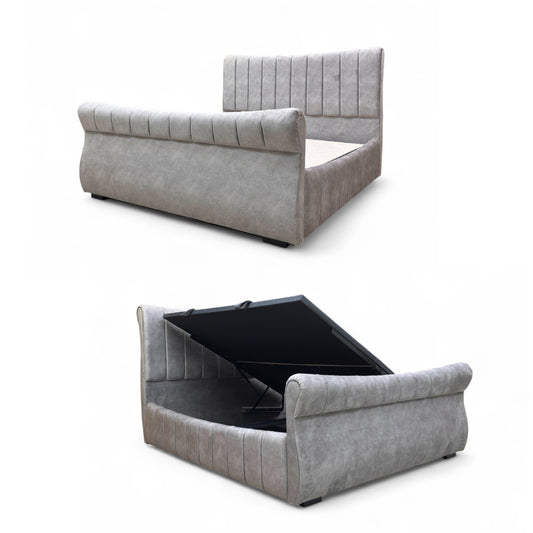 Gray upholstered bed with storage compartment on a white background