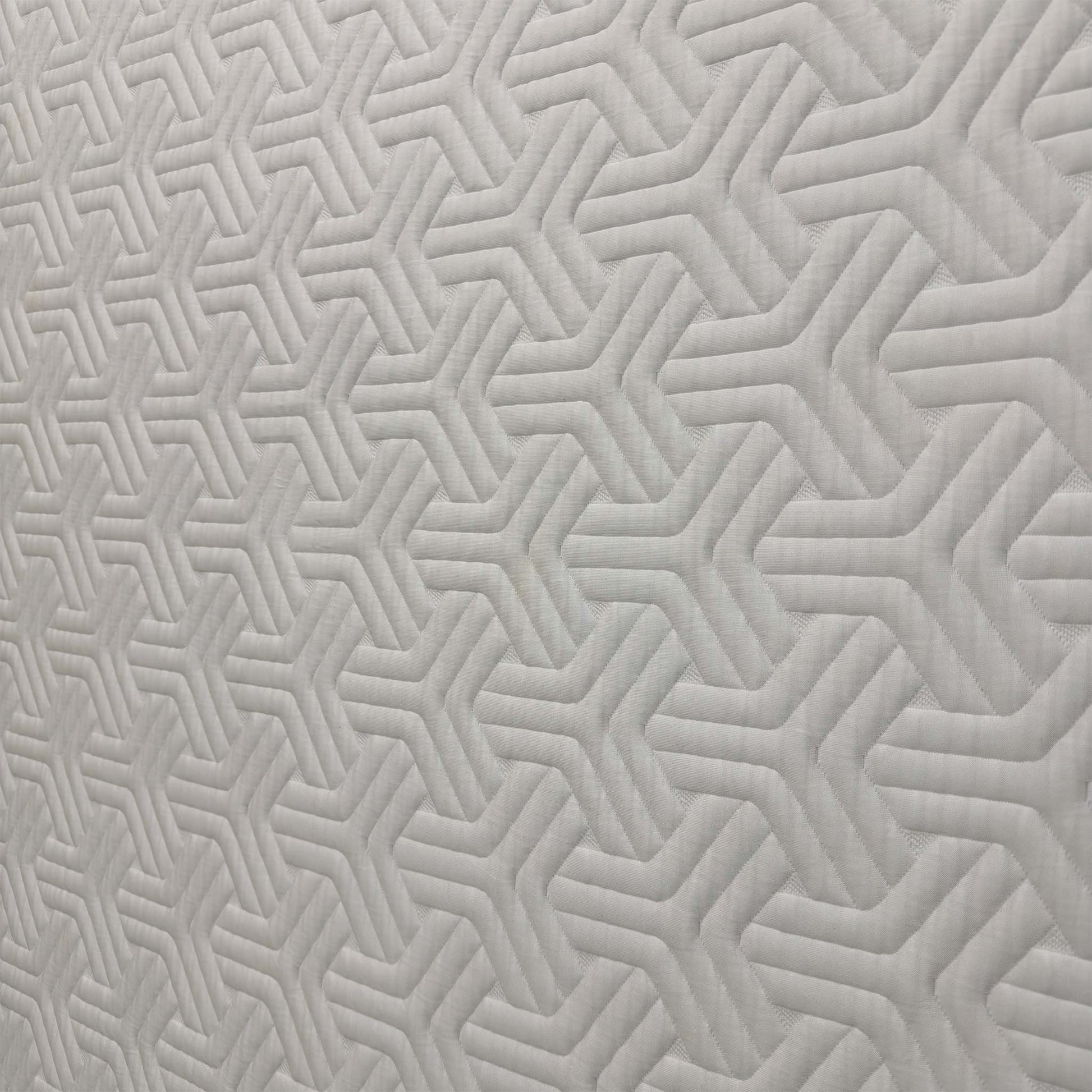Close-up of the Tempur comfort layer, emphasizing the authentic memory foam technology that adapts to body temperature and weight for personalized comfort.