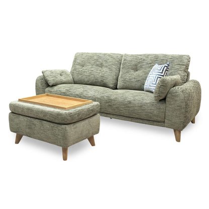 Detailed shot of the sofa corner, showing a visible repair or stitching imperfection on the lower fabric edge.