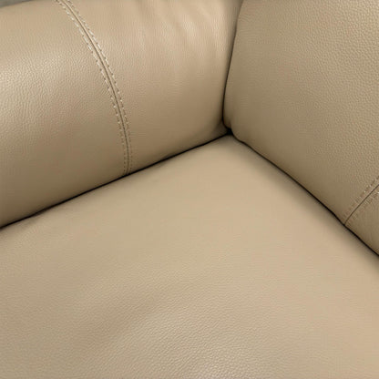 Close-up of the premium Bisque leather, highlighting the natural grain texture and light beige/cream color tone.