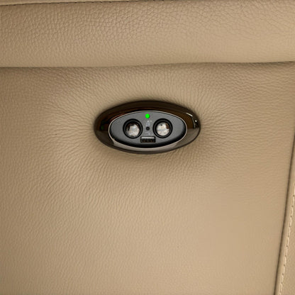 Detailed view of the power reclining controls and integrated USB charging port located on the sofa's outer arm.