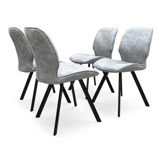 Full View Set of four Furniture Village ‘Montreal’ dining chairs, upholstered in premium soft grey velvet featuring clean lines and a contemporary fixed frame layout.