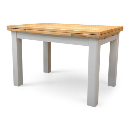 Side profile of the dining table, showcasing the clean, straight lines and the space-saving functionality of the draw-leaf system.