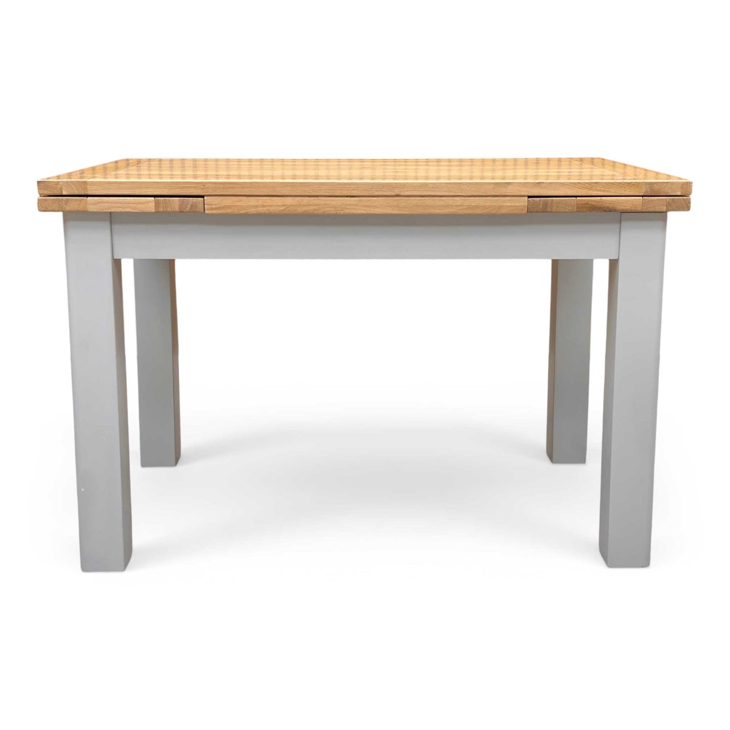 Front shot of the solid oak tabletop, emphasizing the natural knots, unique grain variations, and the durable protective lacquer finish.