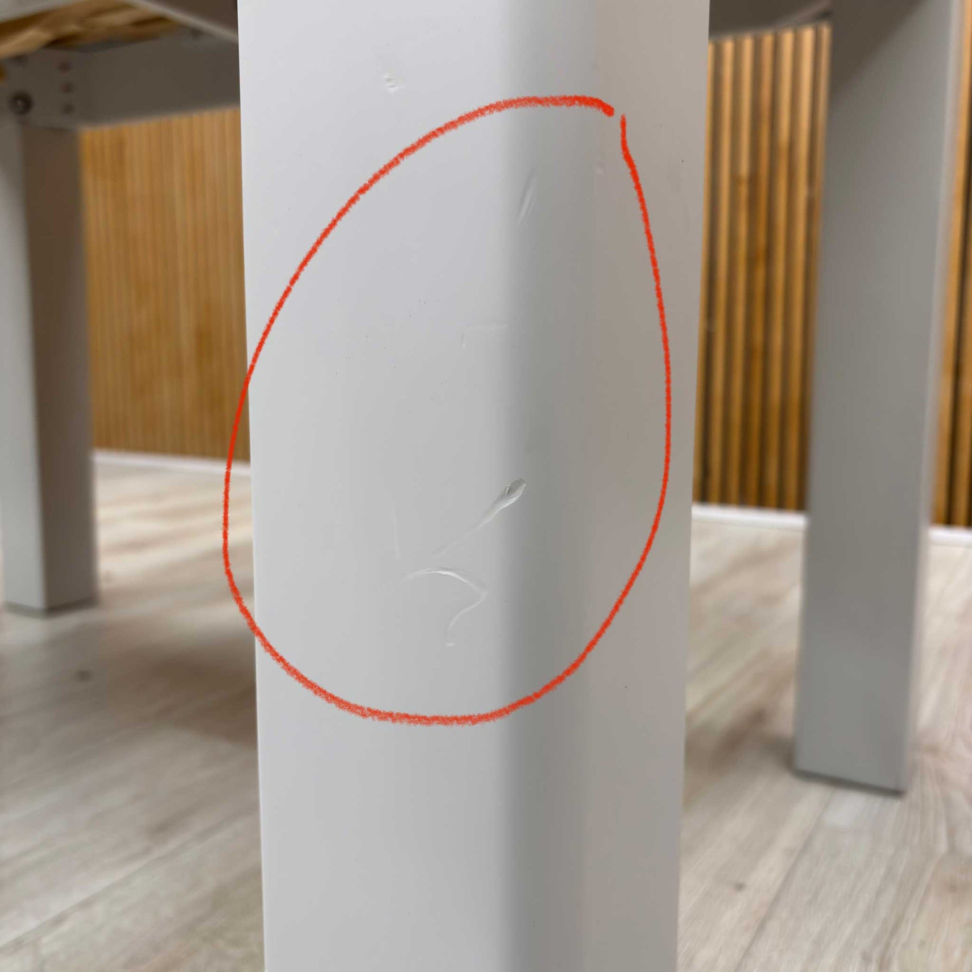 Damage close up Lewis table in its fully extended position, illustrating how the two end leaves pull out to increase the seating capacity for guests.