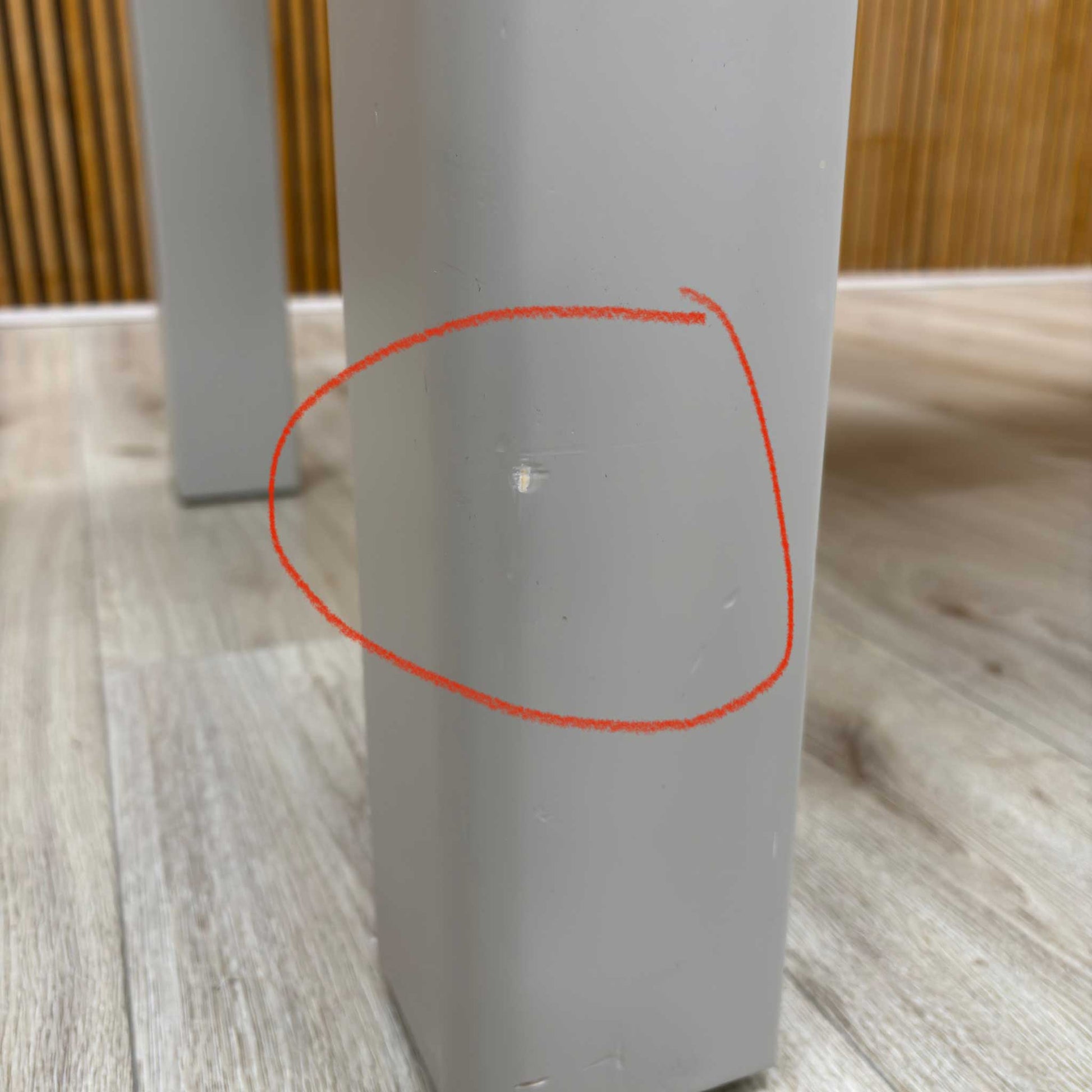 Damage close up Lewis table in its fully extended position, illustrating how the two end leaves pull out to increase the seating capacity for guests.