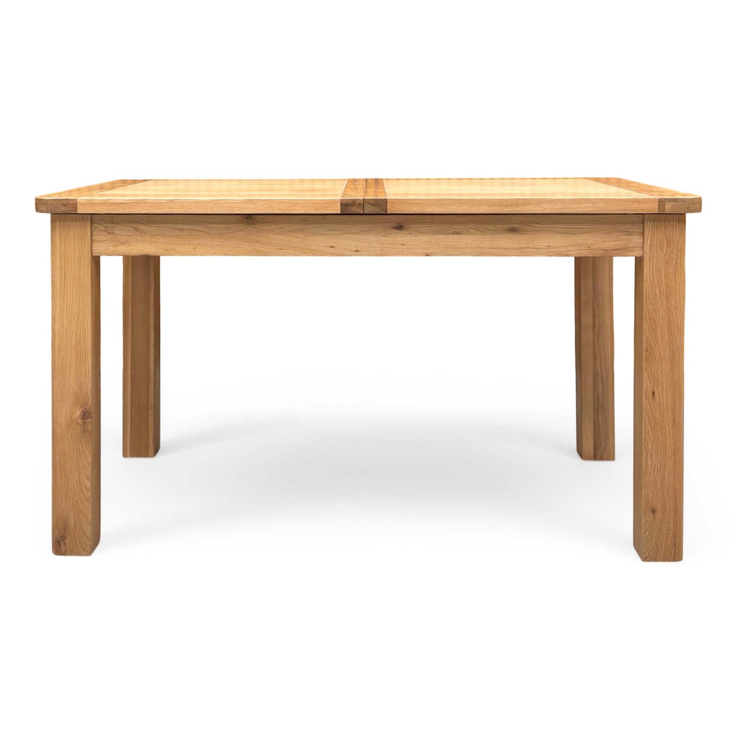 Front view of the Furniture land 'Augusta' solid oak extending dining table, showcasing its modern country style and natural wood grain.