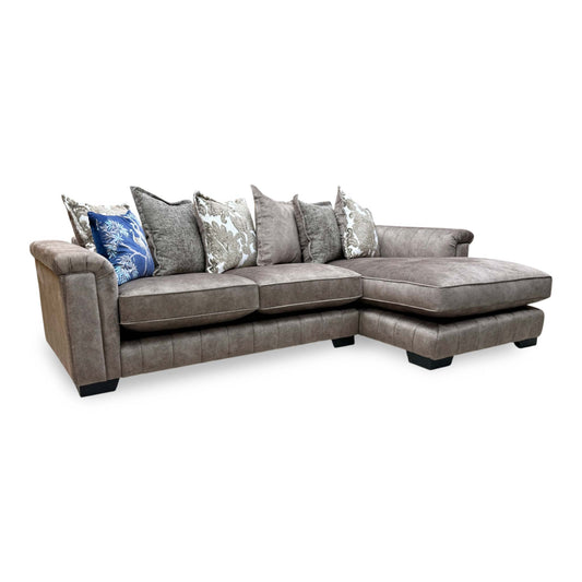 Full view of the Dolcie chaise sofa, showcasing the plush pillow back design and the generous seating area.