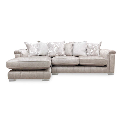 Front view of the oatmeal Dolcie chaise sofa, highlighting the relaxed pillow back design and the left-hand oriented chaise.