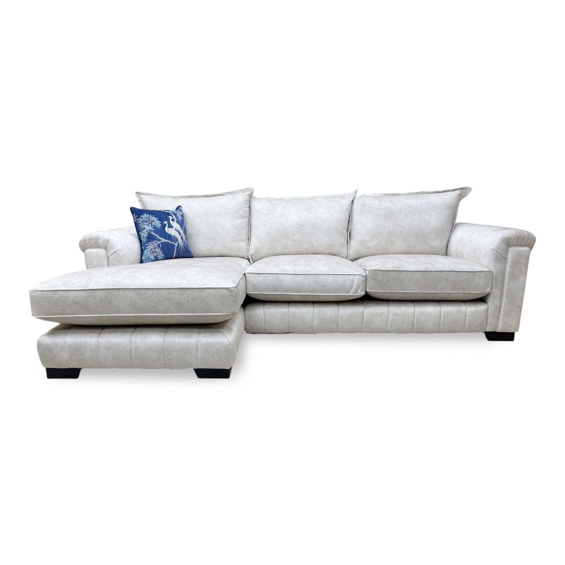 Front view of the Dolcie formal back sofa, showcasing the three-seat layout and sophisticated cream upholstery that complements modern interiors.