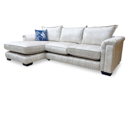 Full view of the DFS 'Dolcie' cream chaise sofa in its left-hand facing configuration, highlighting the clean lines of the formal back design.