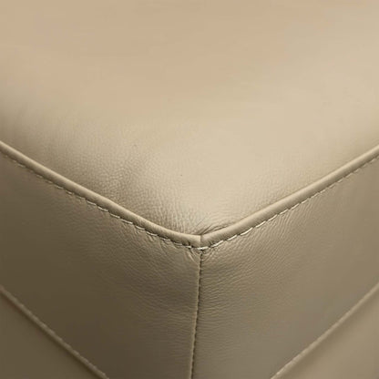 Close-up of the pebble leather texture, highlighting the quality grain and durable finish of the upholstery.