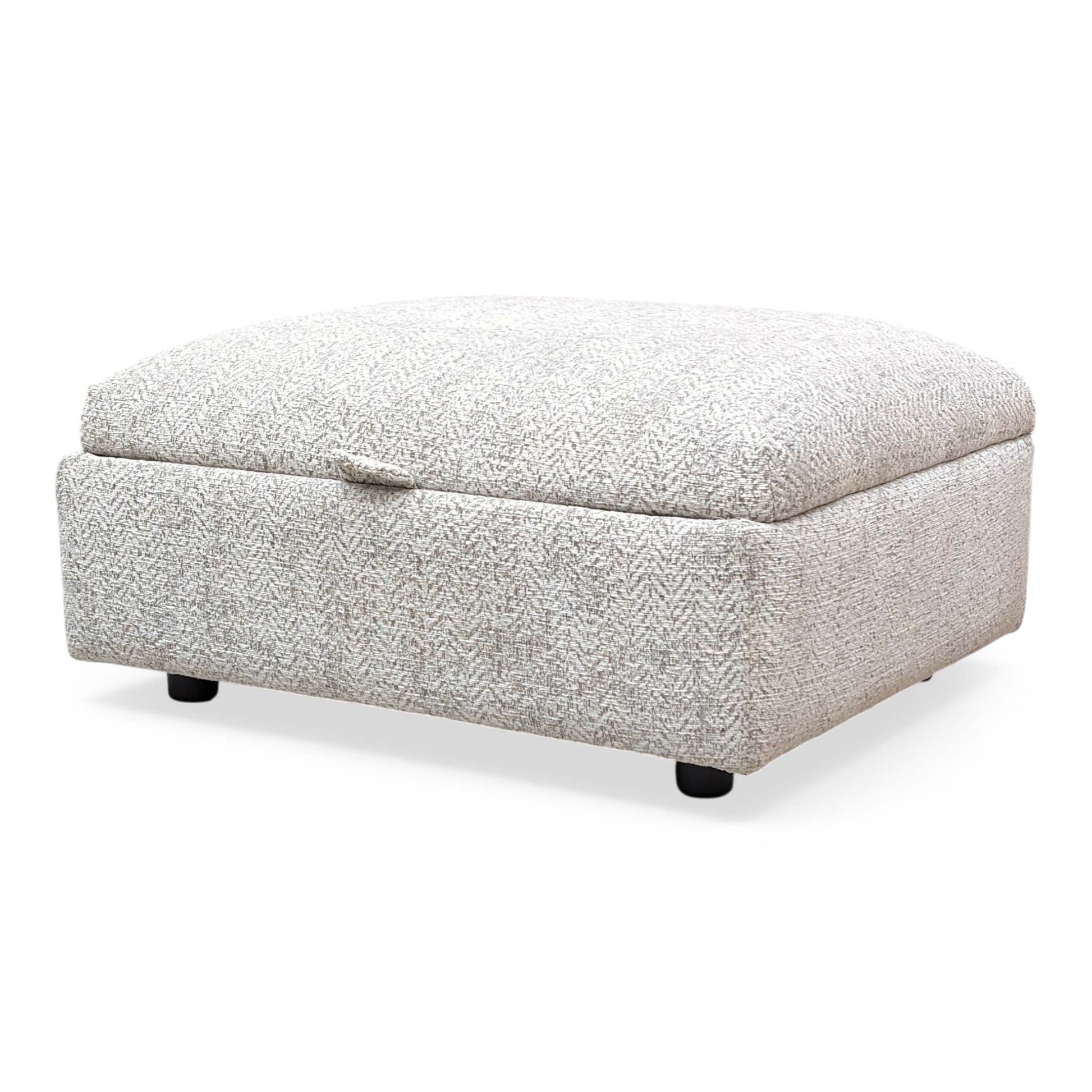 Side view of the Parker Knoll Hudson Storage Stool, demonstrating the smooth gas-strut hinge mechanism and the fabric's soft woven texture.