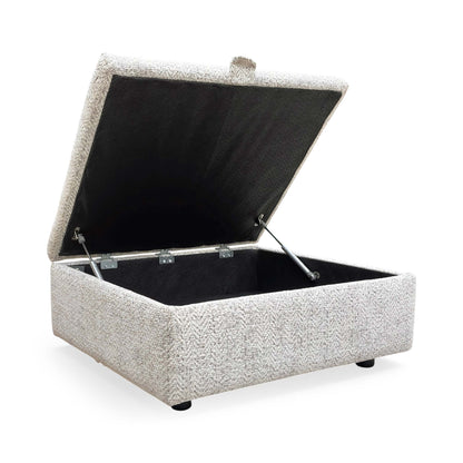 Side view of the Hudson storage stool with the lid open, revealing the spacious internal compartment designed for storing blankets, cushions, or magazines.