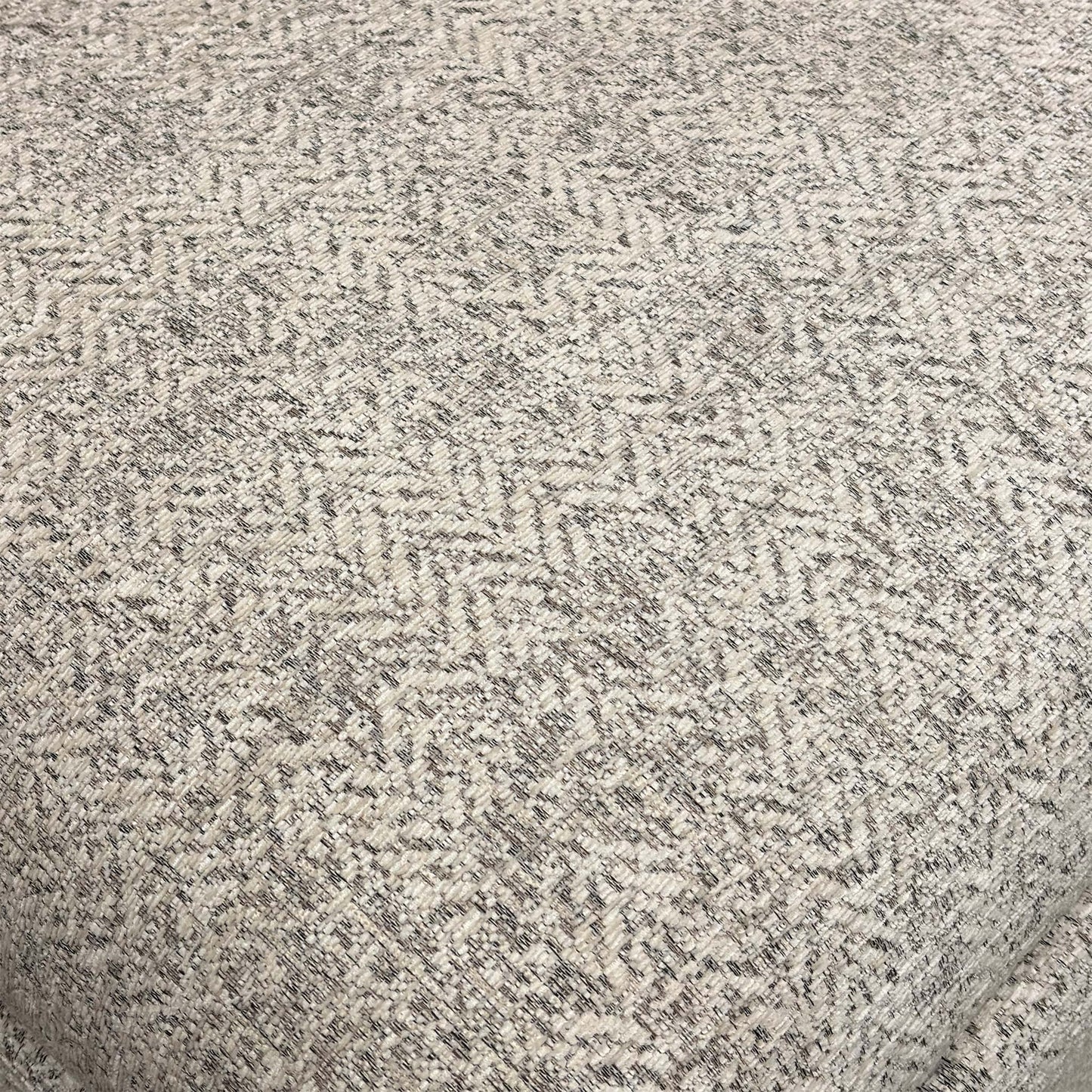 Close-up of the Ida Stone fabric (006035-0055), detailing the high-quality multi-tonal weave and the durable texture of the premium upholstery.