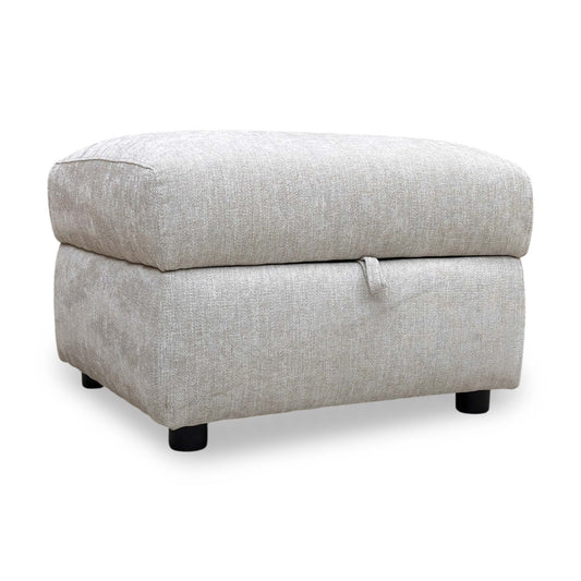 Full view of the 'Hetty' storage footstool in a versatile grey fabric, featuring a clean rectangular design and subtle dark block feet.