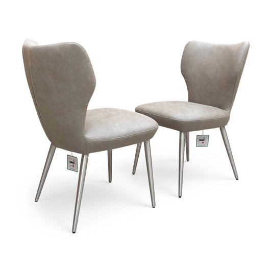 Full view of modern 'Elegante' dining chairs upholstered in taupe suede, featuring clean lines and brushed stainless steel legs.