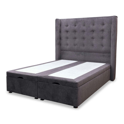 Side profile of the winged headboard, emphasizing its "boutique hotel" design and flawless floor-standing upholstery.