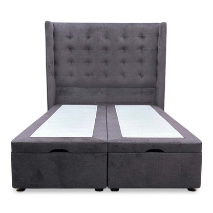 Front view of the Artisian Collection 'Onyx' Double bed, featuring a high floor-standing headboard in Smokey Quartz fabric and an ottoman divan base.