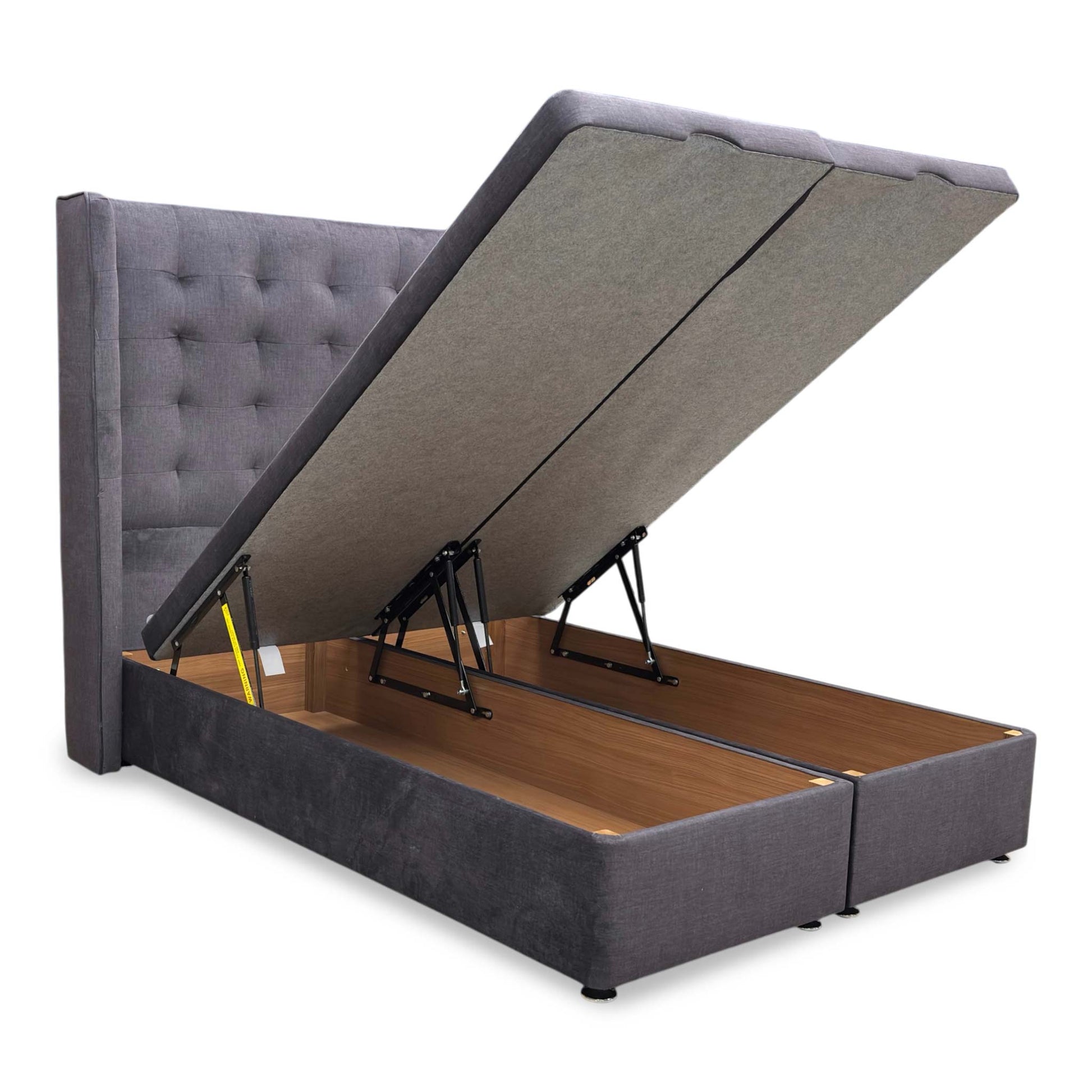 Detailed shot of the ottoman lift mechanism and the sturdy internal storage compartment of the divan base.