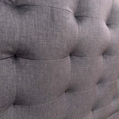 Close-up of the Smokey Quartz fabric, showing the high-quality woven texture and detailed button tufting on the headboard.