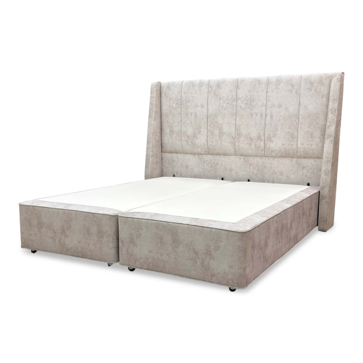 Side view detail of the Hypnos Bespoke Sprung Divan Base, emphasizing the high-quality fabric finish and sturdy construction.