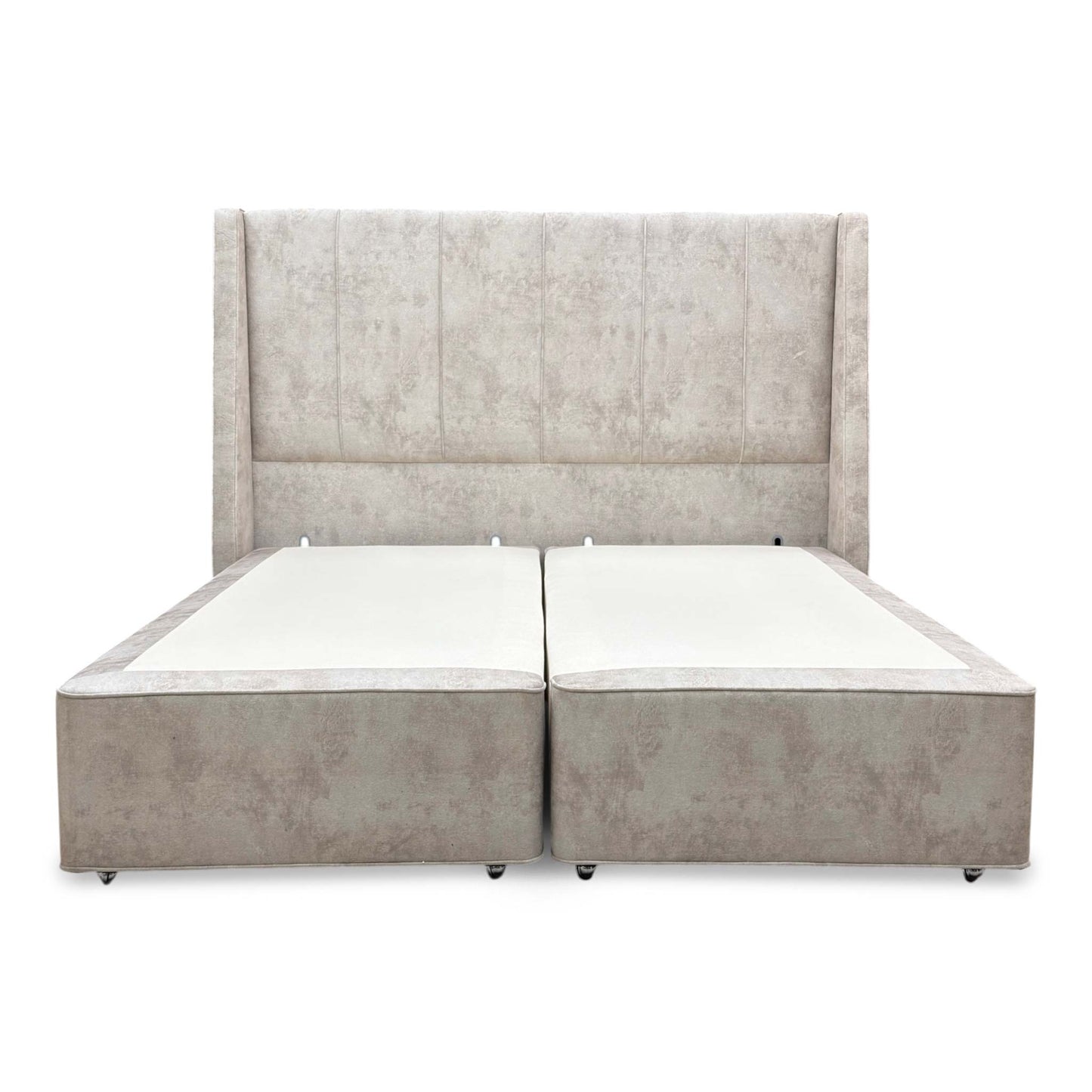 Front view of the Super King 'Longwick' bed, featuring a floor-standing headboard in Dapple Stone velvet and a Hypnos divan base.