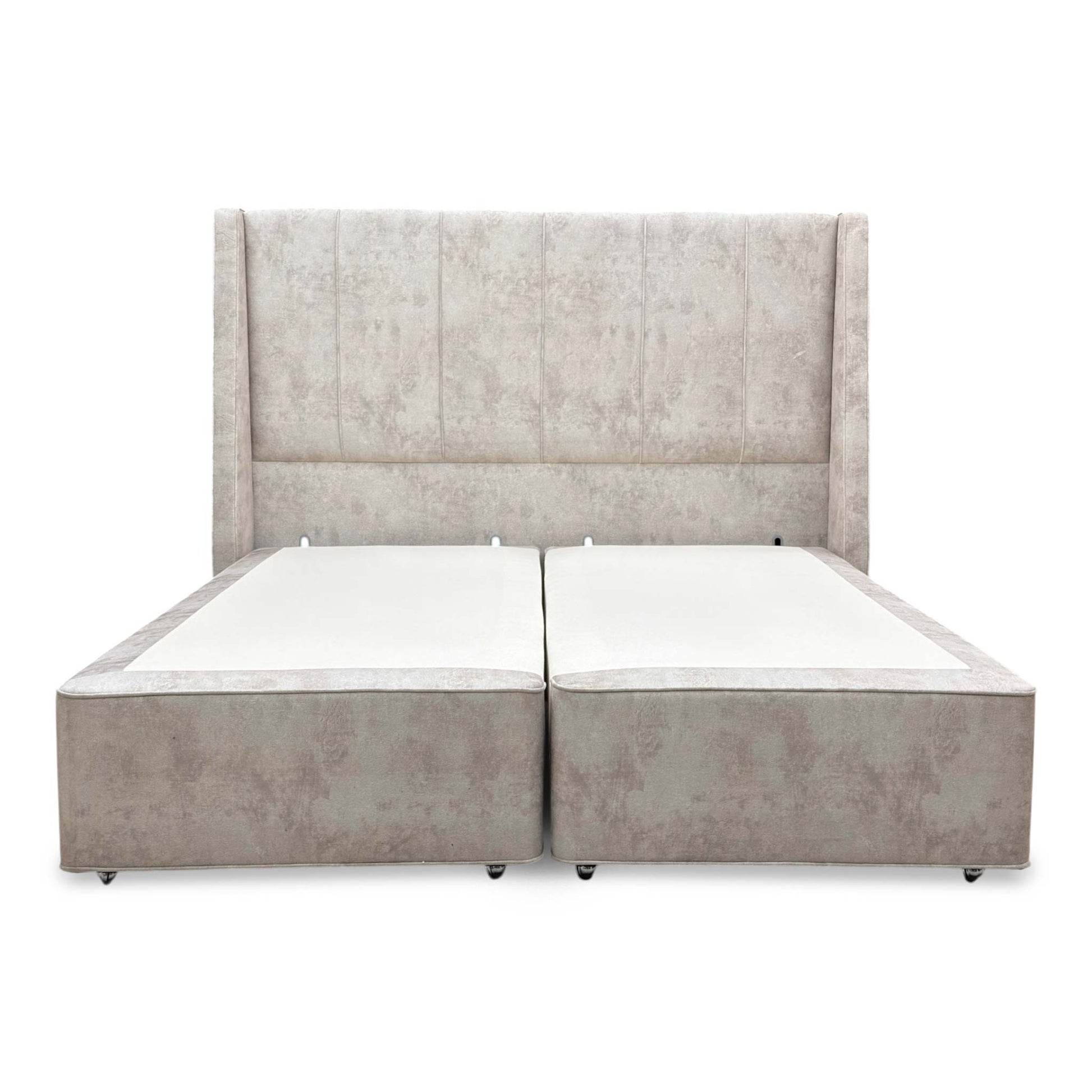 Front view of the Super King 'Longwick' bed, featuring a floor-standing headboard in Dapple Stone velvet and a Hypnos divan base.