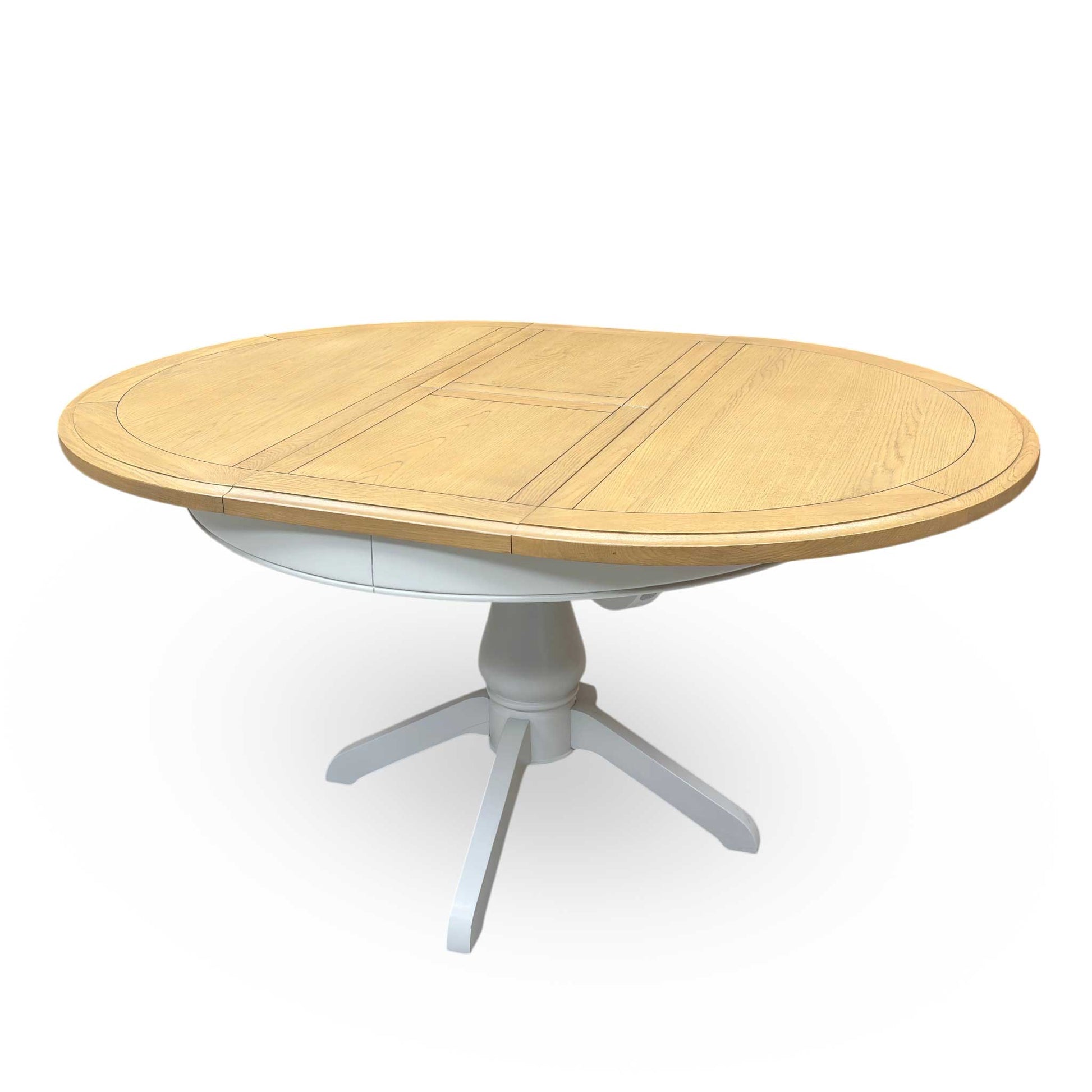 Side view of the 'Hamilton' table's smooth extending extension mechanism, sturdy build, and natural wood texture.