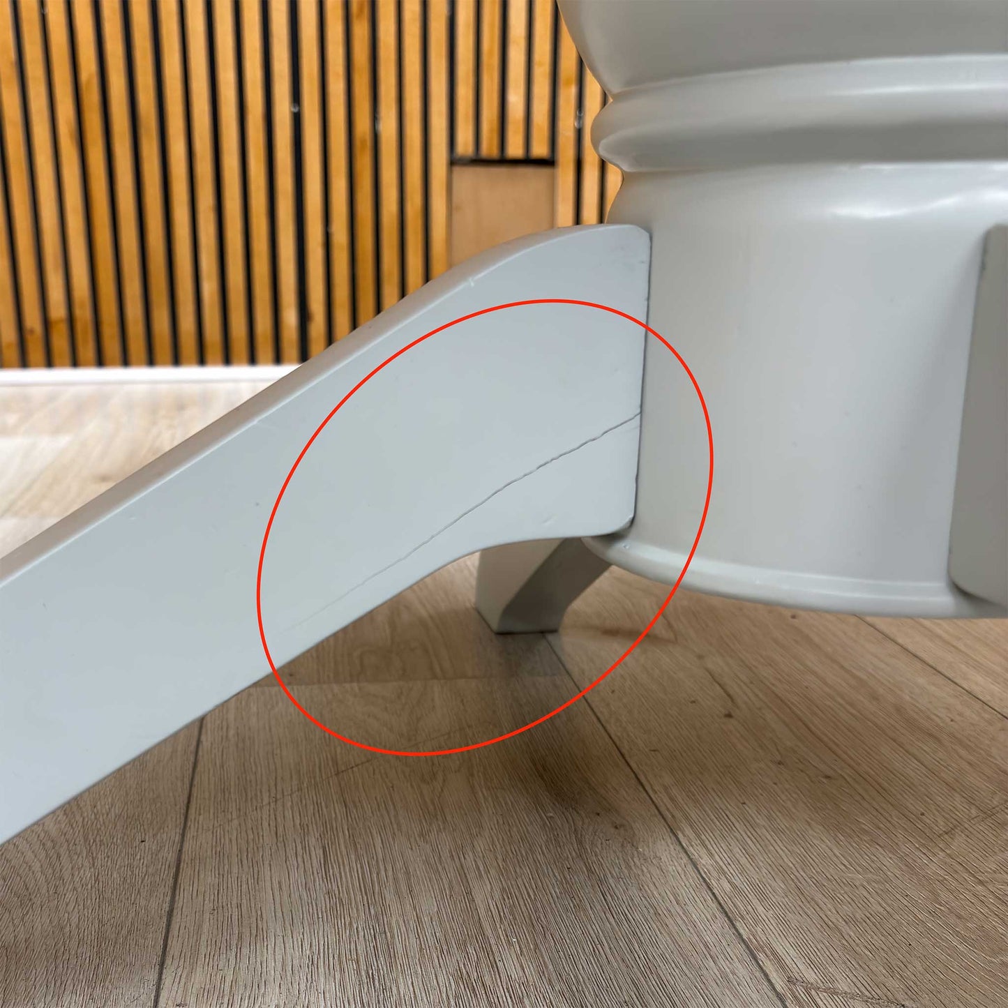 Detail shot of the sturdy pedestal leg construction, highlighting the high-quality craftsmanship and robust support frame designed to maximize legroom.