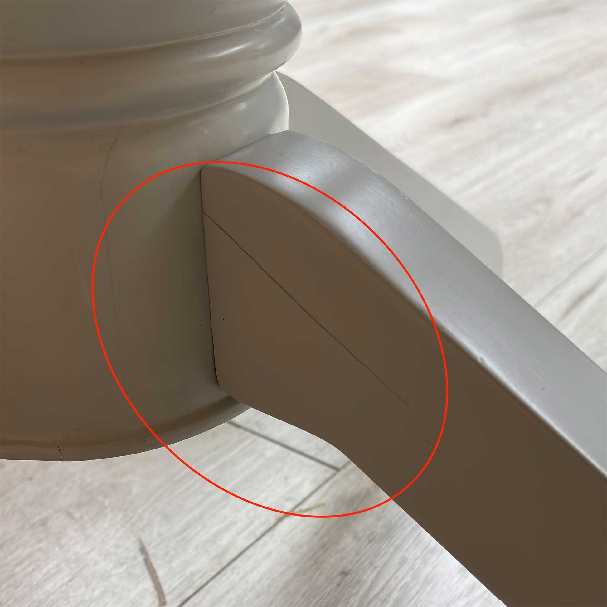 Detail shot of the sturdy pedestal leg construction, highlighting the high-quality craftsmanship and robust support frame designed to maximize legroom.