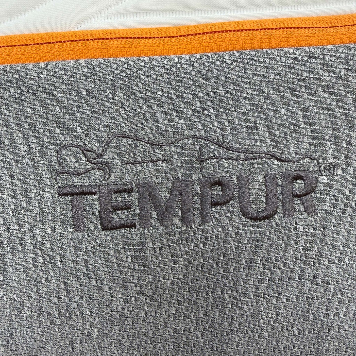 Closeup shot view of the King Size mattress, showcasing the clean, white aesthetic and the high-quality finish of the side panels.