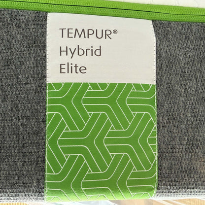 Detail shot of the internal layers (cutaway view), showing the Advanced TEMPUR Material and the Precision MicroCoils.