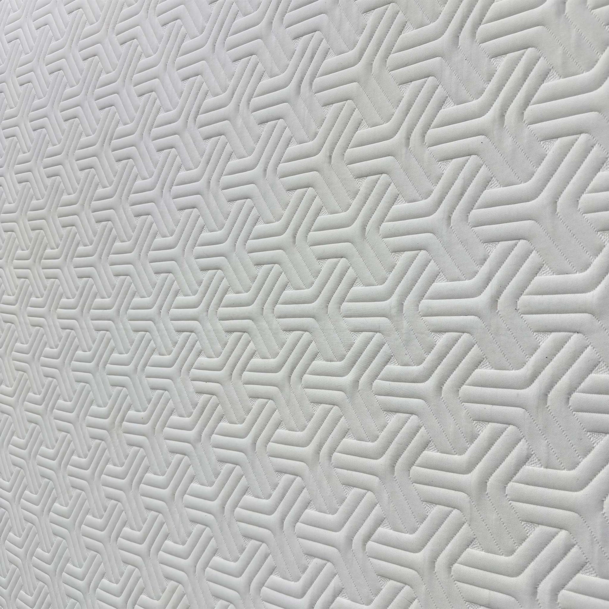 Close-up of the QuickRefresh™ cover fabric, highlighting the breathable knit and the easy-to-use zipper for removal.