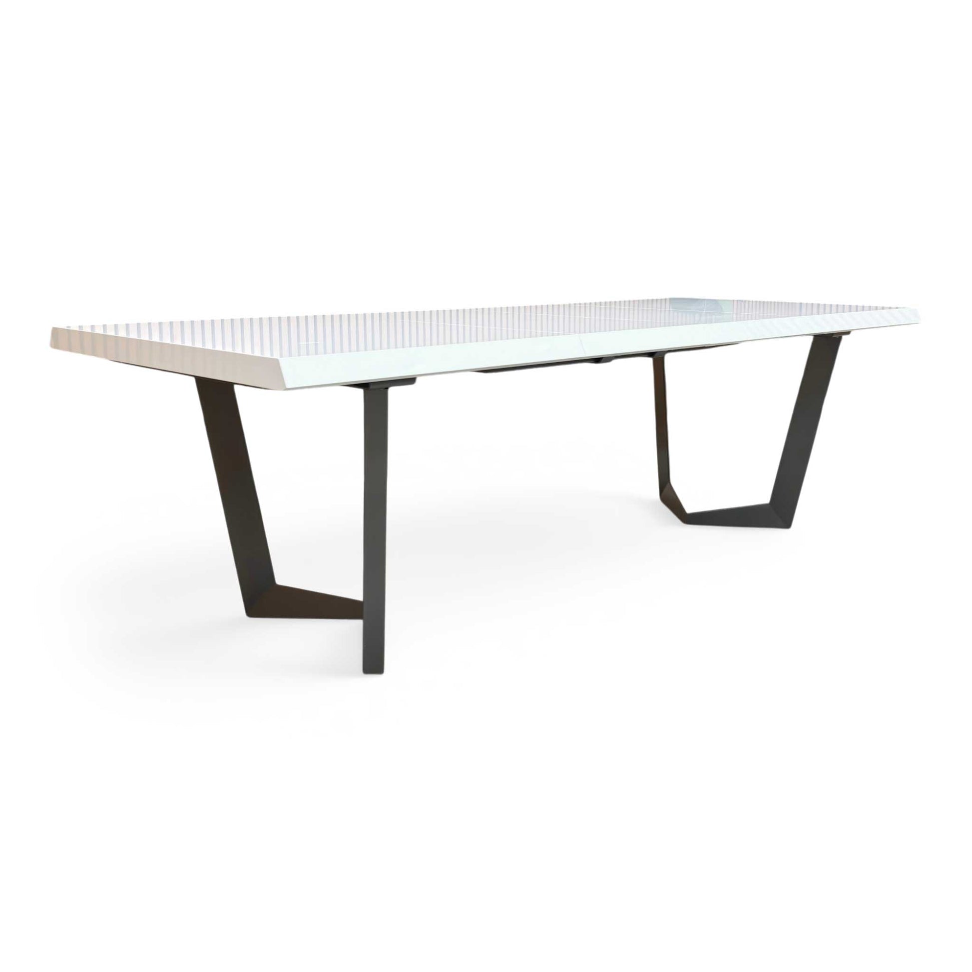 Side profile of the Palazzo table, emphasizing the clean, minimalist lines and the reflective quality of the white lacquer finish.