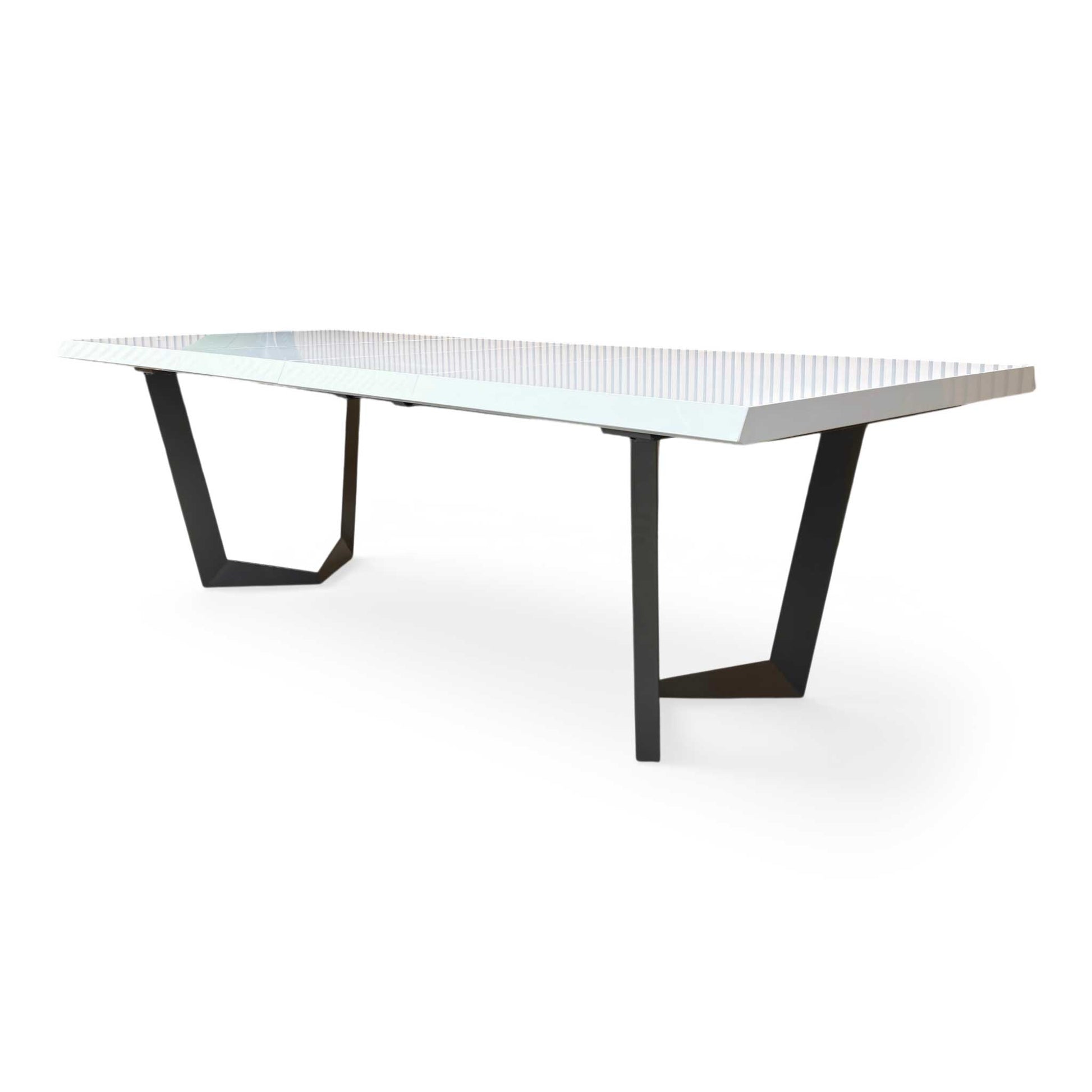Side profile of the Palazzo table, emphasizing the clean, minimalist lines and the reflective quality of the white lacquer finish.