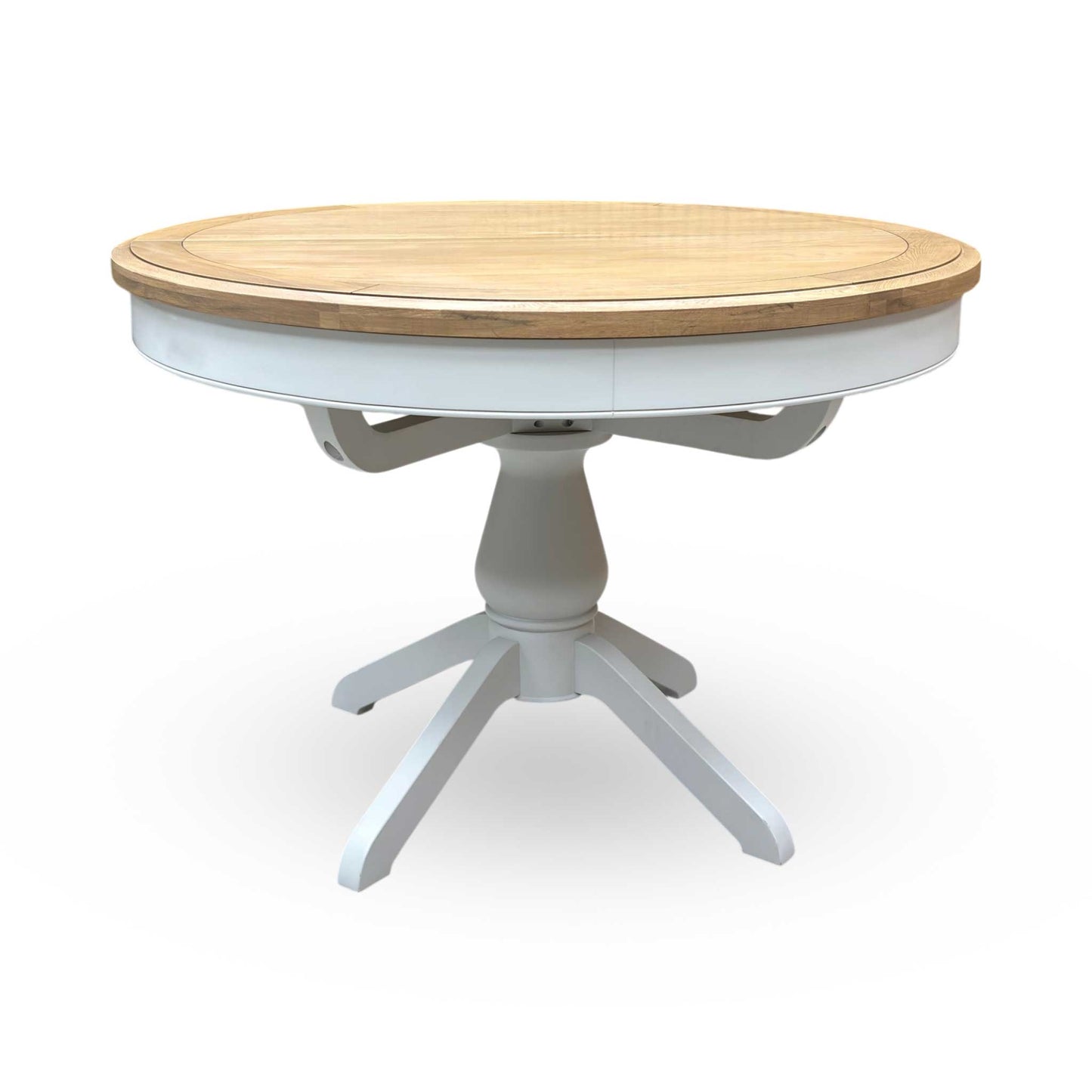 Top-down view of the Hamilton solid oak table, showcasing the warm, natural patterns of the premium American oak and the smooth lacquered protective finish.