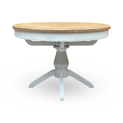 Top-down view of the Hamilton solid oak table, showcasing the warm, natural patterns of the premium American oak and the smooth lacquered protective finish.