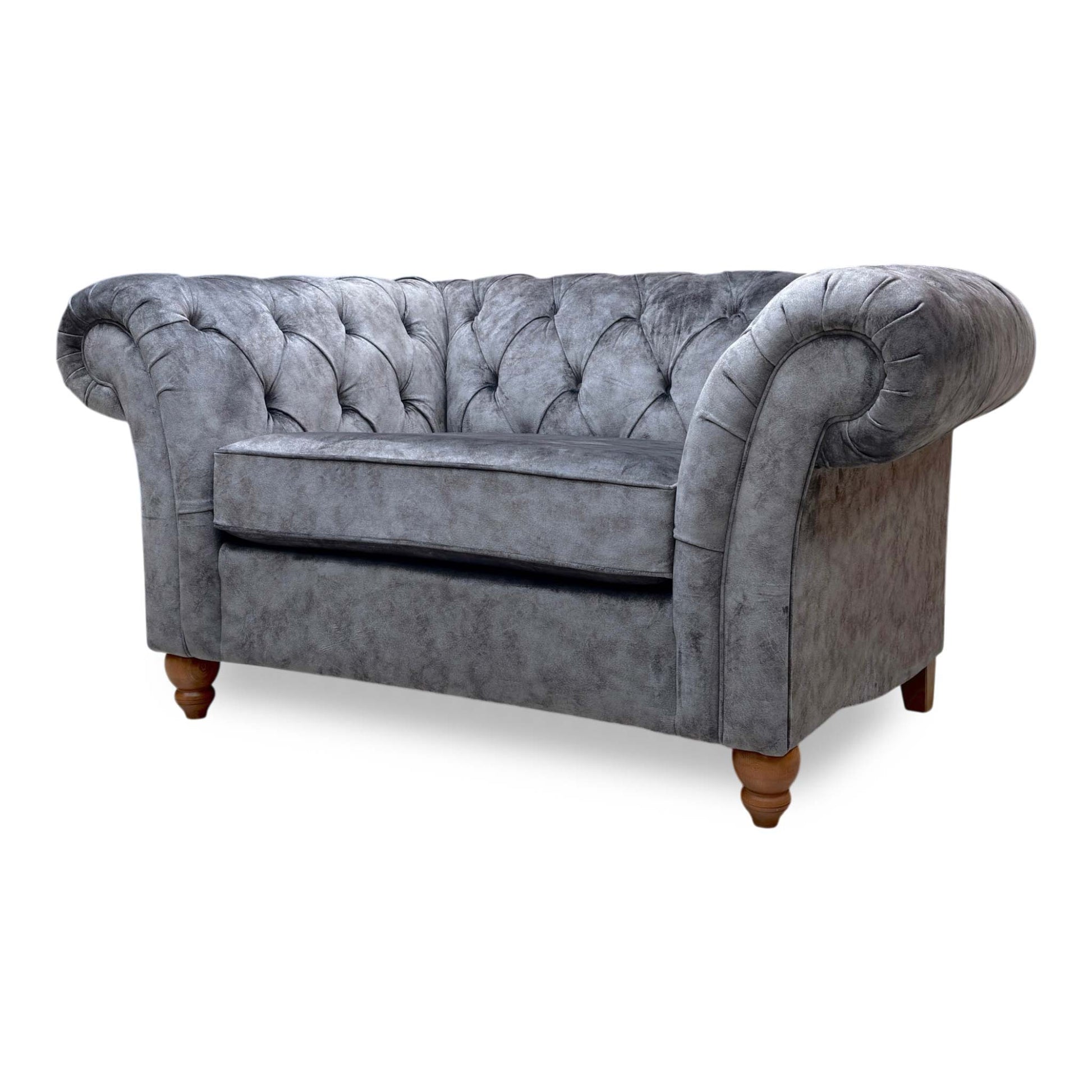 Side profile of the Gosford Snuggler, emphasizing the elegant curve of the scroll arms and the sturdy frame construction.