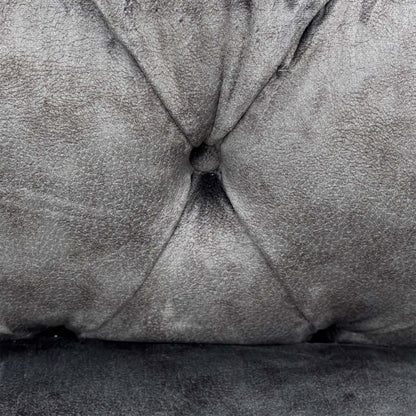 Close-up of the Charcoal Grey velvet fabric, highlighting the dense pile and the subtle sheen of the upholstery.