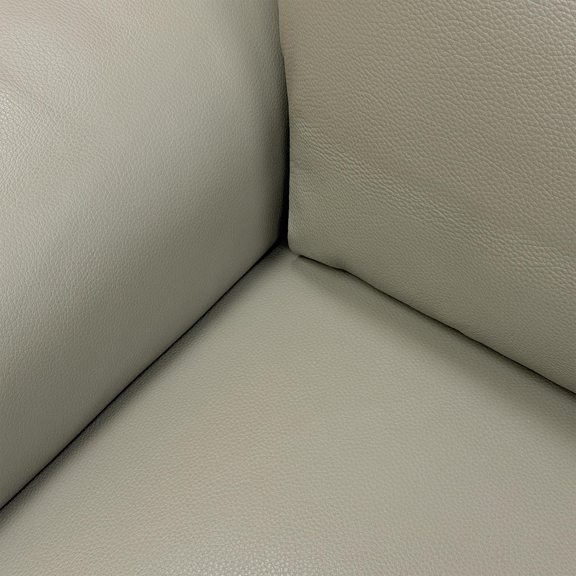Close-up of the elephant grey leather texture, highlighting the premium grain, durable stitching, and the soft, matte finish of the material.