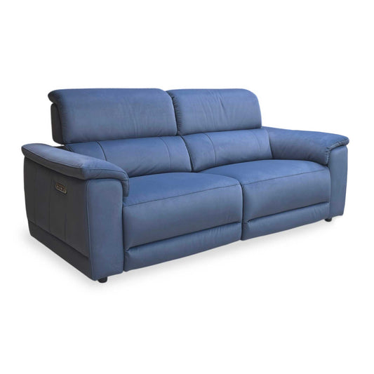 Side profile of the Genius Bella sofa, emphasizing the reclining clearance and the contemporary silhouette of the padded armrests.