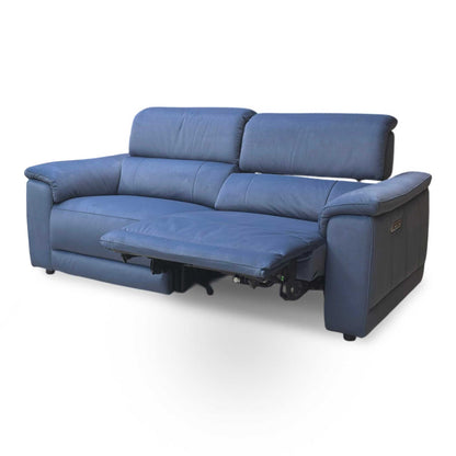 Side profile of the Genius Bella sofa, emphasizing the reclining clearance and the contemporary silhouette of the padded armrests.