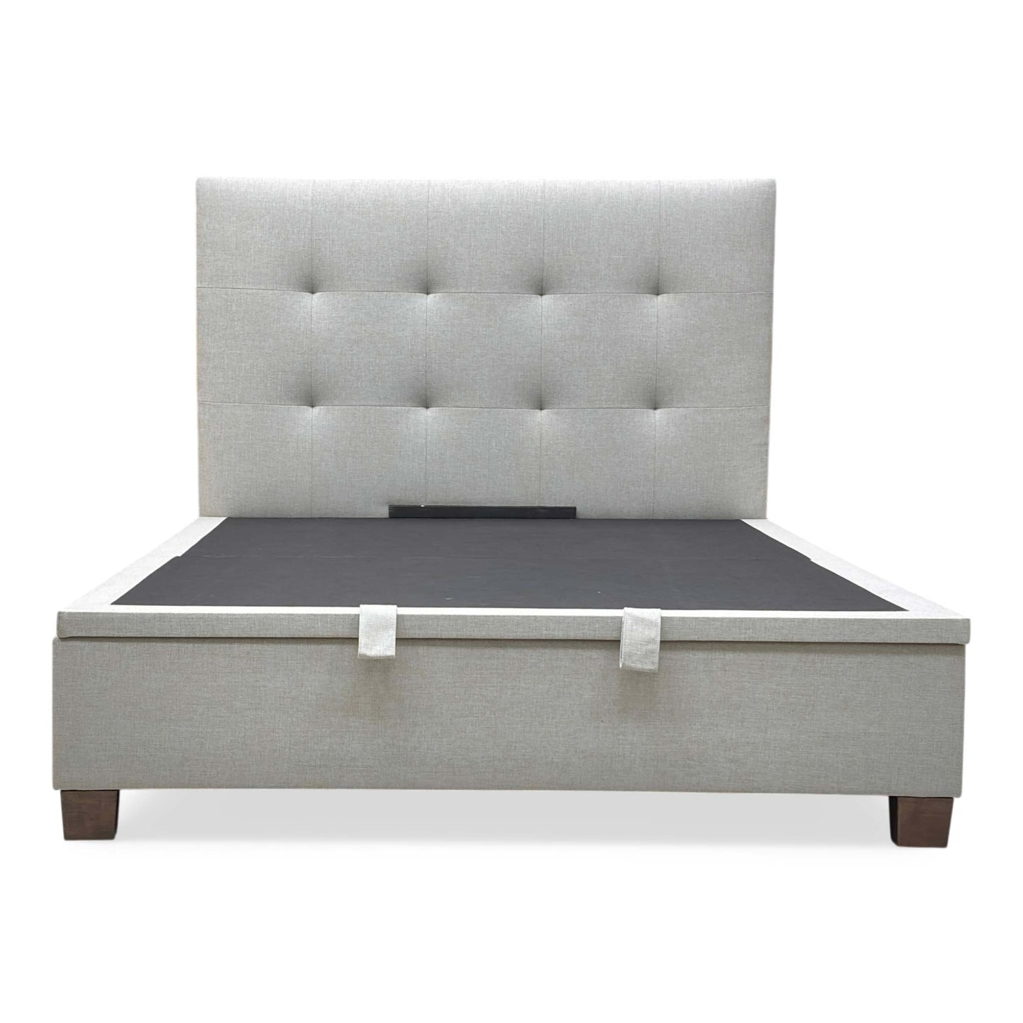 Front view of the Hadley King size end-lift ottoman bed frame in Oatmeal fabric, featuring a tall padded headboard and a sleek upholstered frame.