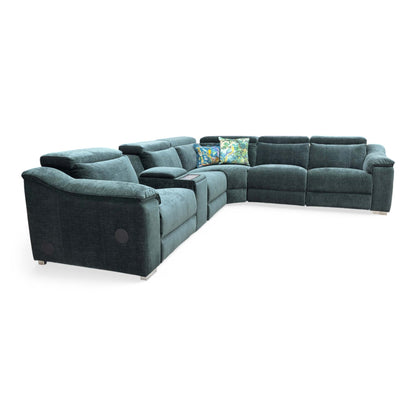 Side profile of the reclining end-seat, showing the extended footrest and the adjustable power headrest in motion.