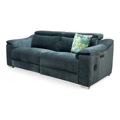 Side profile of the Geneva sofa in full recline, emphasizing the ergonomic leg support and the modern brushed-metal control panels.